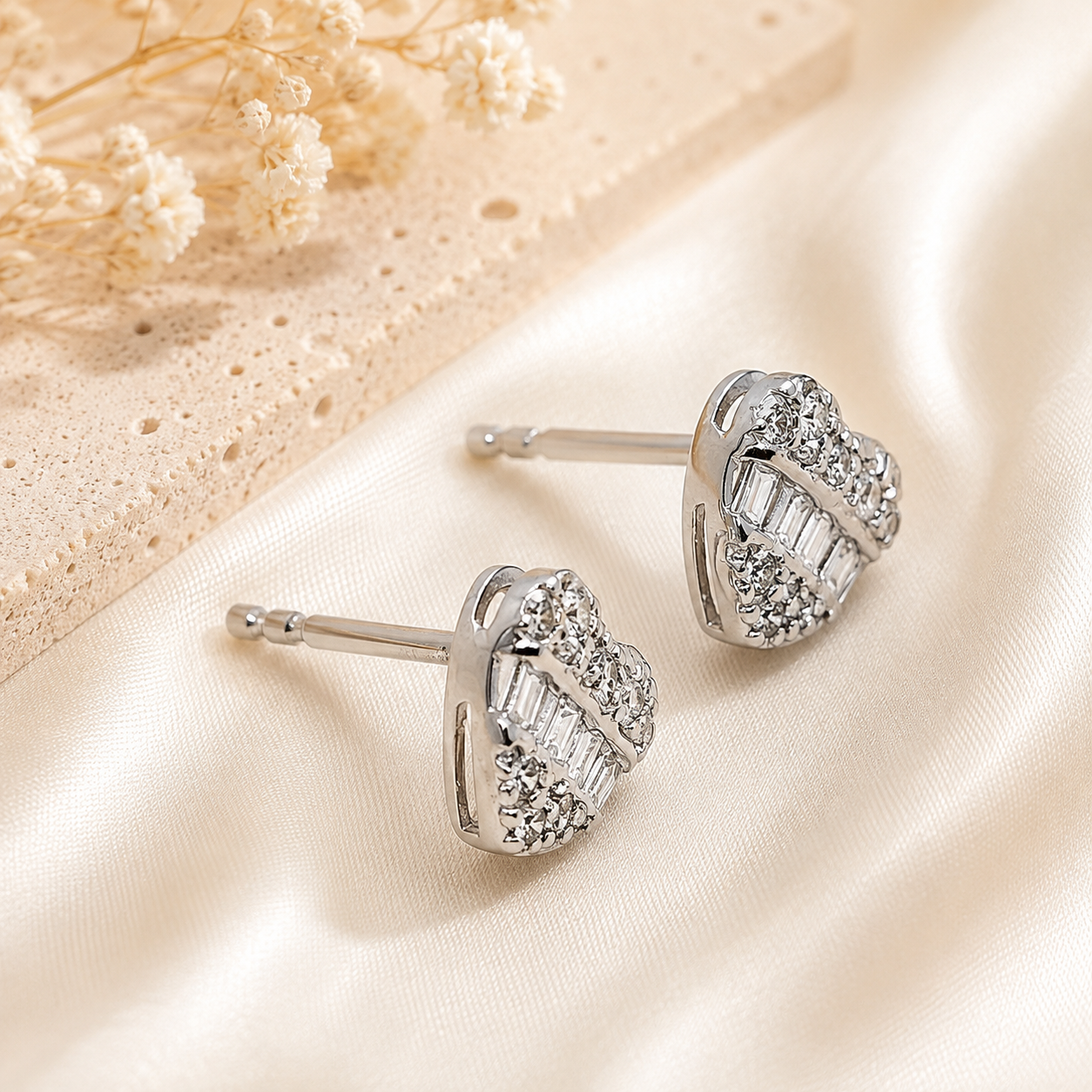 Heart diamond stud earrings detail view