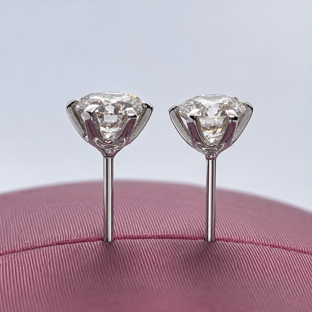 Classic diamond stud earrings angled detail view