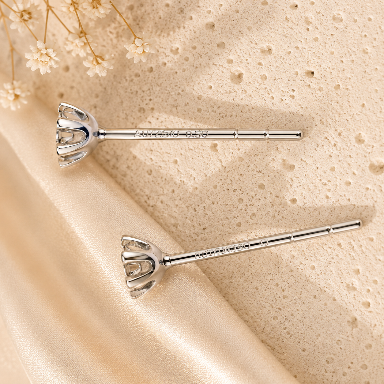 Classic diamond stud earrings setting detail view