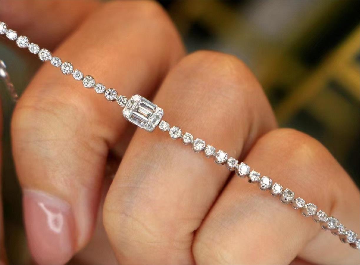 Diamond tennis bracelet shown on hand